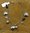armbandje metaal met leuke bedels hartjes,strass,glitter ± 25 cm