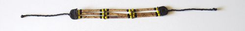 Bamboe armband 15 cm  met gele kralen en leer stukjes + katoenen koord ±19cm